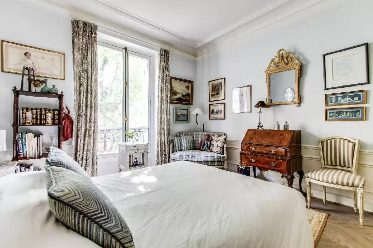 beautiful and well-appointed bedroom in 3-bedroom Paris luxury apartment