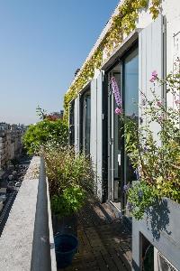 verdant balcony in Paris luxury apartment