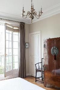 antique wooden cabinet in Paris luxury apartment