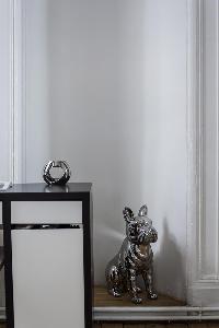 study desk and silver statue in Paris luxury apartment