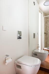 sleek white toilet in Paris luxury apartment