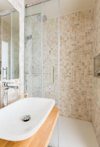 sleek shower area in Paris luxury apartment