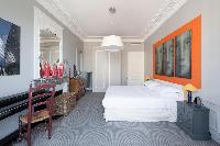calming master bedroom in Paris luxury apartment