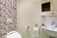 stylish-walled toilet in Paris luxury apartment