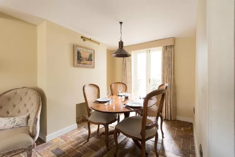 fancy dining room of London St Mary's Gardens II luxury apartment