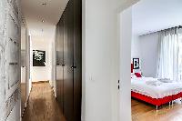 hallway with closet and access to the stylish bedroom in paris luxury apartment