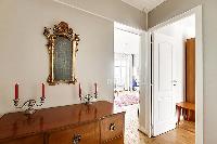 classic wooden closet and candle lit in paris luxury apartment