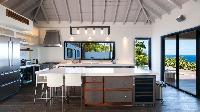 cool modern kitchen of Saint Barth Villa Jocapana luxury holiday home, vacation rental