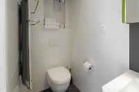 neat and trim toilet and bath in Marais - Saint Claude luxury apartment