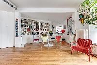 2 bedroom Paris luxury apartment with its original hardwood floors, open floor concept, and mid-cent