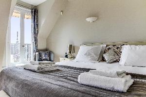 fresh bed sheets in Champs Elysées - Matignon Penthouse luxury apartment