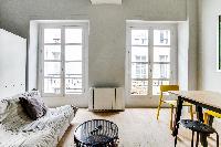 generous windows of Marais - Turenne 1 bedroom luxury apartment