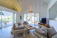 cool living room of Saint Barth Villa Lagon Rose luxury holiday home, vacation rental