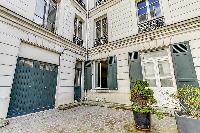 charming exterior of Port Royal - Les Gobelins luxury apartment