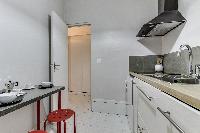 modern kitchen appliances in Port Royal - Les Gobelins luxury apartment
