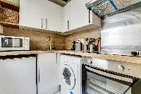 well-appointed kitchen of Saint Germain des Pres - Colombier Studio luxury apartment