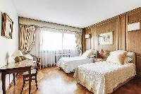 dainty bedroom in Trocadéro - Poincaré 3 Bedrooms I luxury apartment