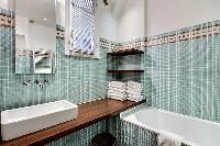 cool bathroom with tub in Saint Germain des Prés - Bonaparte luxury apartment