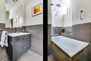cool rain shower and tub in Marais - Francs Bourgeois luxury apartment