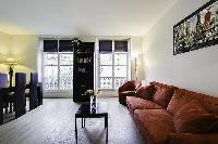 tall windows of Saint Germain des Prés - Dragon II luxury apartment