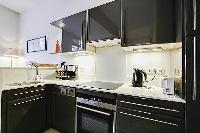 sleek kitchen of Saint Germain des Prés - Dragon I luxury apartment