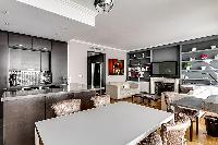 modern elegantly decorated living area, a dining area, a kitchen, two bathrooms, and two bedrooms pa