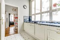 generous windows of Champs Elysées - Paul Baudry 1 bedroom luxury apartment