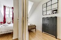 second and third bedrooms in a 3-bedroom Paris luxury apartment