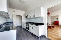 well-equipped kitchen in a 2-bedroom Paris luxury apartment