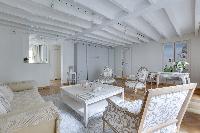 delightful living room of Notre Dame - Colbert Suite luxury apartment