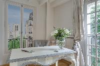 delightful dining room of Notre Dame - Colbert Suite luxury apartment
