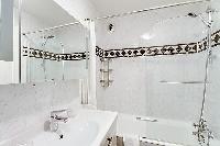 clean bathroom with tub in Saint Germain des Prés - Luxembourg Suite luxury apartment