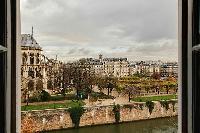 wonderful views of Notre Dame de Paris, rue des Grands Degrés, and the Seine River from a 3-bedroom 