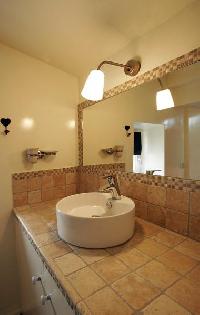 bathroom with sink in a 2-bedroom Paris luxury apartment