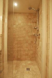 bathroom with shower in a 2-bedroom Paris luxury apartment