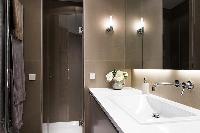 sink and mirror in a Paris luxury apartment