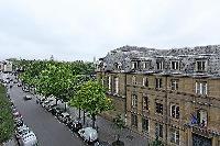 street view from the Frenchwindows of a 3-bedroom Paris luxury apartment