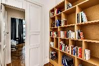 bookshelves in a 3-bedroom Paris luxury apartment