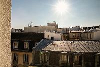view from the French windows of a 1-bedroom Paris luxury apartment