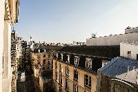 view from the French windows of a 1-bedroom Paris luxury apartment