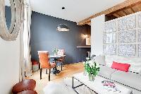 cozy living area with comfortable atmosphere 1-bedroom Paris luxury apartment