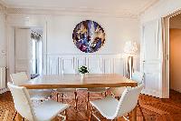 chic dining set for six in a 2-bedroom paris luxury apartment