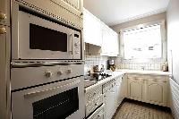 kitchen kitchen appliances in Trocadero - Sablons luxury apartment