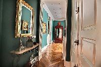 hallway with classic interiors in paris luxury apartment