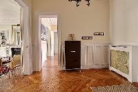 3-bedroom Paris luxury apartment tastefully decorated interiors with its original wooden floors
