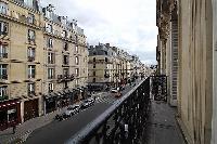 street view from the balcony in a 3-bedroom Paris luxury apartment