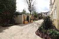 courtyard with trees and plants in a 3-bedroom Paris luxury apartment