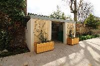 courtyard with trees and plants in a 3-bedroom Paris luxury apartment