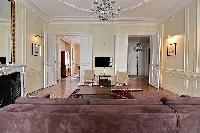 3-bedroom Paris luxury apartment tastefully decorated interiors with its original wooden floors