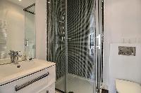 bathroom with sink and shower in Paris luxury apartment